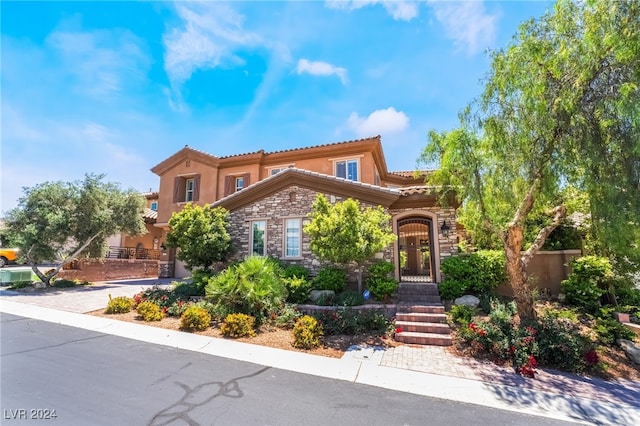 2804 Josephine Dr, Henderson, NV 89044 - mediterranean / spanish home with stone siding, stucco siding, and a tile roof