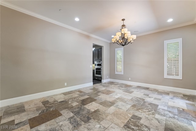 2804 Josephine Dr, Henderson, NV 89044 - empty room with stone tile flooring, crown molding, a chandelier, baseboards, and recessed lighting