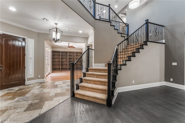2804 Josephine Dr, Henderson, NV 89044 - foyer featuring baseboards, stairway, a chandelier, recessed lighting, and a towering ceiling