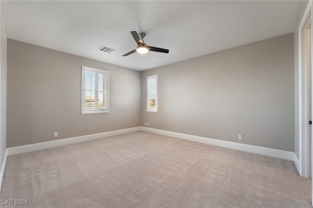 2804 Josephine Dr, Henderson, NV 89044 - empty room featuring a ceiling fan, light carpet, and baseboards