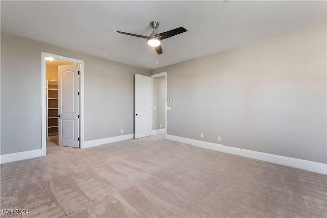 2804 Josephine Dr, Henderson, NV 89044 - unfurnished room featuring a ceiling fan, light colored carpet, and baseboards