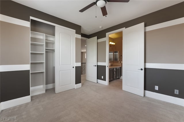 2804 Josephine Dr, Henderson, NV 89044 - unfurnished bedroom with light carpet, baseboards, a closet, connected bathroom, and ceiling fan