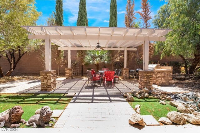 2804 Josephine Dr, Henderson, NV 89044 - view of patio featuring area for grilling, a pergola, outdoor dining space, and a ceiling fan