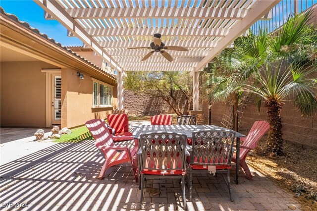 2804 Josephine Dr, Henderson, NV 89044 - view of patio with ceiling fan, a pergola, and outdoor dining area