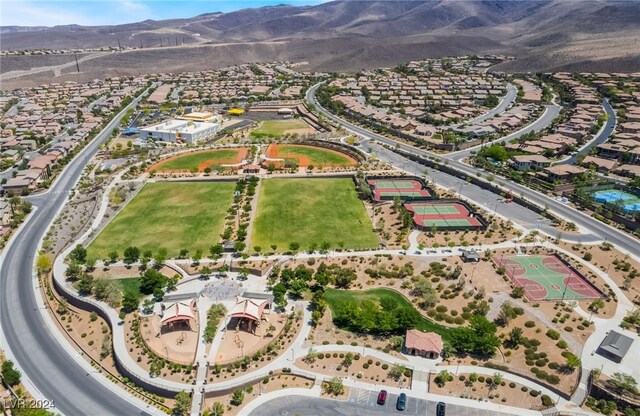 2804 Josephine Dr, Henderson, NV 89044 - aerial overview of property's location with a mountainous background and nearby suburban area