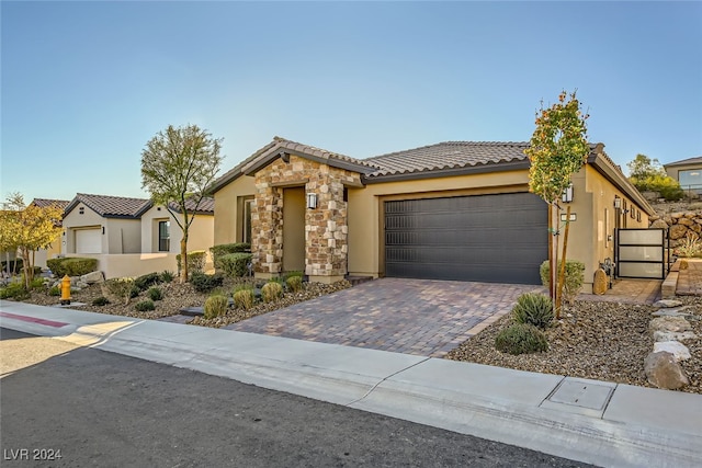 view of front of home with a garage