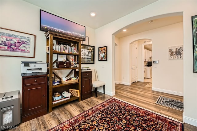 interior space featuring light hardwood / wood-style floors and heating unit