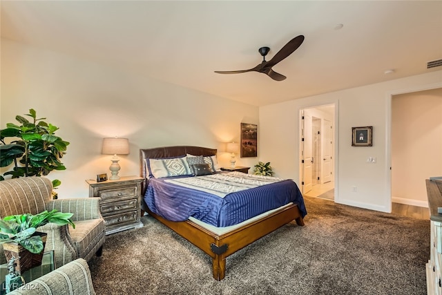 bedroom with carpet, ensuite bath, and ceiling fan