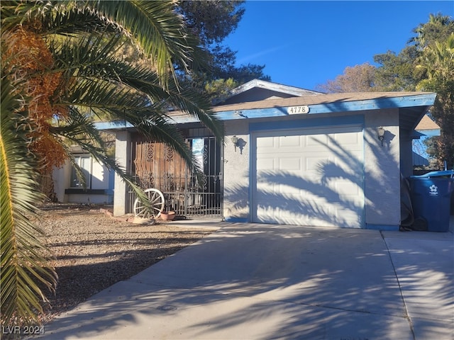 view of front of home with a garage