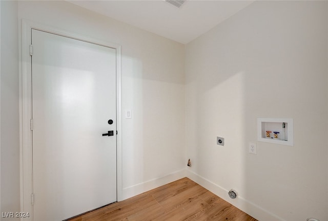 laundry area with washer hookup, light hardwood / wood-style flooring, and electric dryer hookup