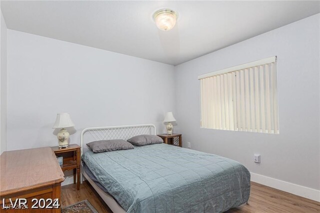 bedroom featuring hardwood / wood-style floors