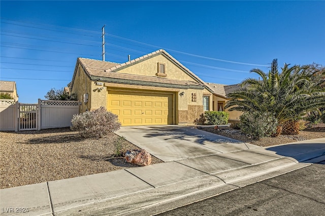 view of front of property featuring a garage