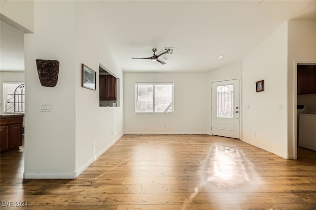 interior space with hardwood / wood-style floors and ceiling fan