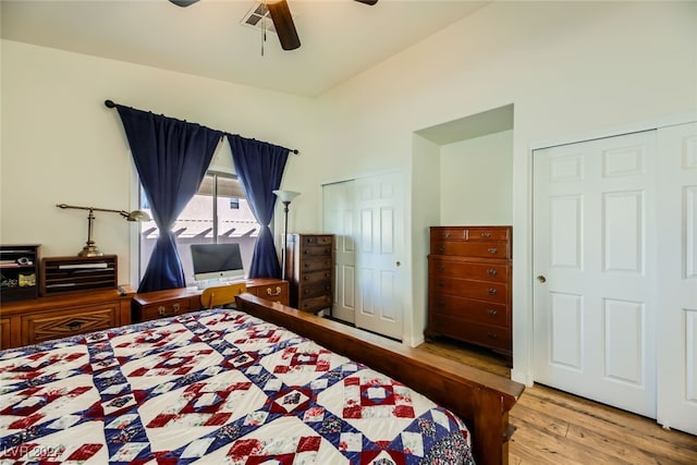 bedroom with ceiling fan and light hardwood / wood-style flooring