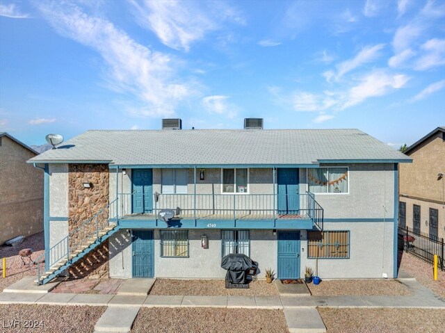 4740 Corsaire Ave, Las Vegas, NV 89115 - view of property featuring stairway and central AC