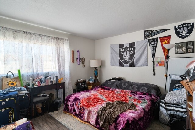 4740 Corsaire Ave, Las Vegas, NV 89115 - bedroom featuring wood finished floors