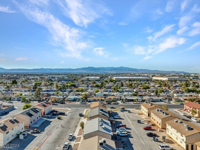 4740 Corsaire Ave, Las Vegas, NV 89115 - aerial perspective of suburban area with a mountainous background