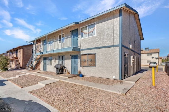 4740 Corsaire Ave, Las Vegas, NV 89115 - view of property featuring stairway