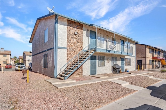 4740 Corsaire Ave, Las Vegas, NV 89115 - view of building exterior featuring stairway