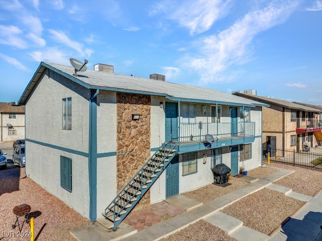 4740 Corsaire Ave, Las Vegas, NV 89115 - view of building exterior with stairs