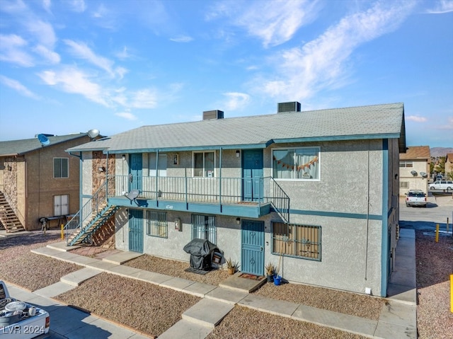 4740 Corsaire Ave, Las Vegas, NV 89115 - view of property featuring stairway