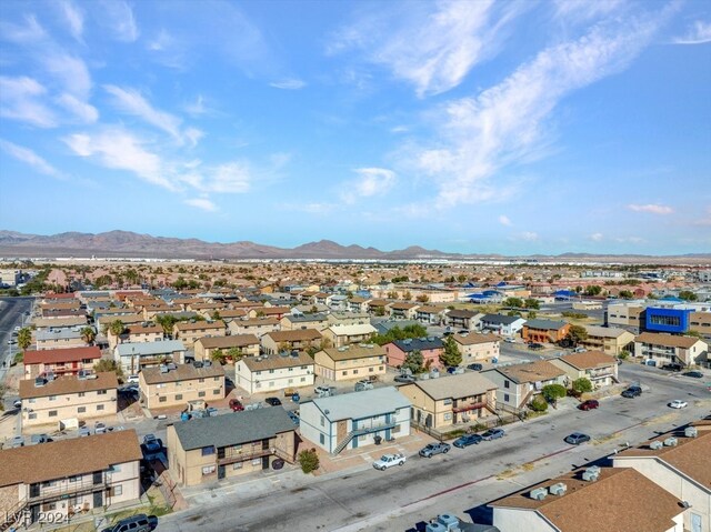 4740 Corsaire Ave, Las Vegas, NV 89115 - aerial view of residential area with a mountainous background