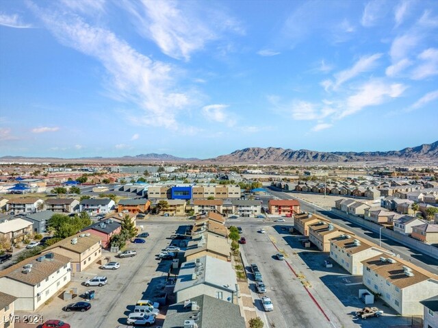 4740 Corsaire Ave, Las Vegas, NV 89115 - aerial perspective of suburban area with a mountainous background