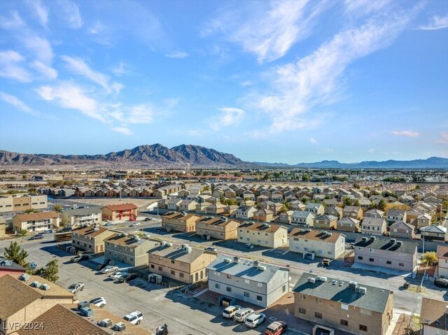 4740 Corsaire Ave, Las Vegas, NV 89115 - aerial perspective of suburban area with a mountainous background
