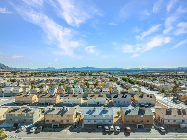 4740 Corsaire Ave, Las Vegas, NV 89115 - aerial perspective of suburban area featuring a mountain backdrop