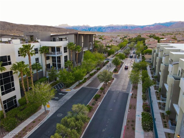 drone / aerial view featuring a mountain view