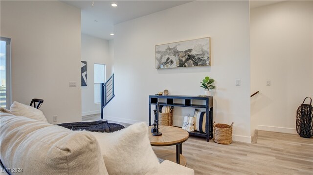 living room with light hardwood / wood-style floors