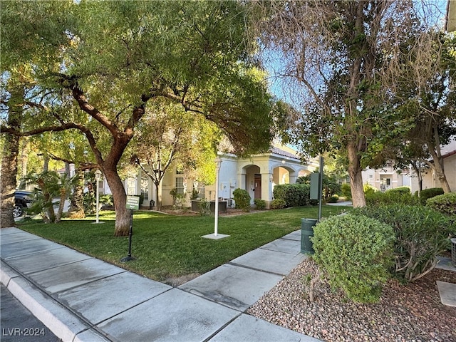 view of front of property with a front lawn