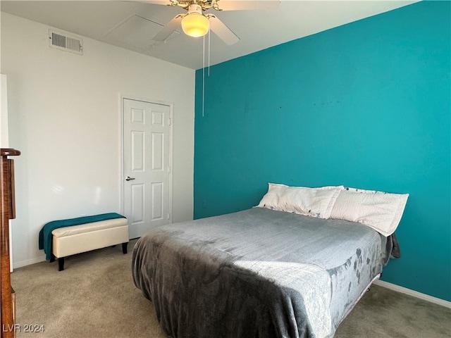 bedroom with ceiling fan and carpet floors