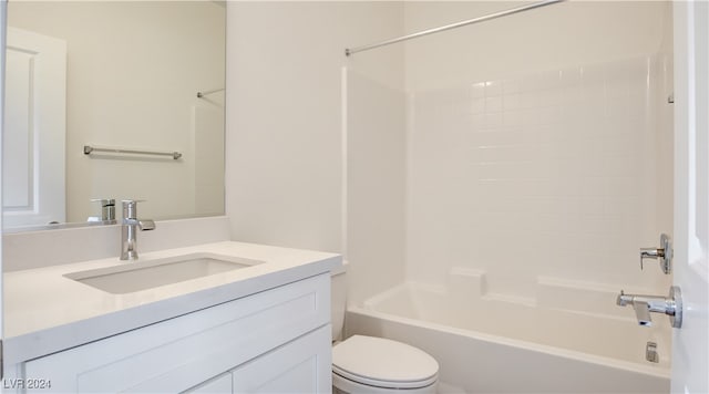 full bathroom with washtub / shower combination, vanity, and toilet