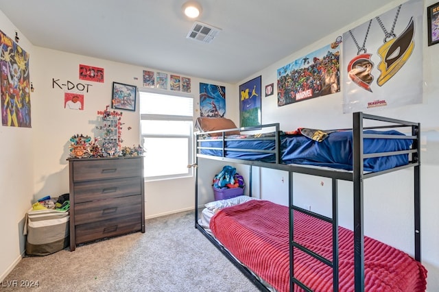 bedroom featuring carpet