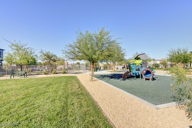 view of jungle gym with a yard