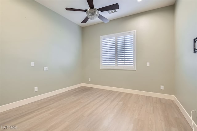 unfurnished room with ceiling fan and light hardwood / wood-style floors