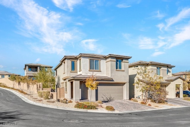 view of front of property with a garage