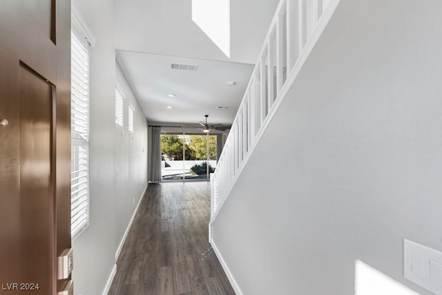 hallway featuring dark hardwood / wood-style flooring