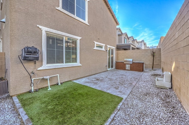 exterior space featuring area for grilling and a patio