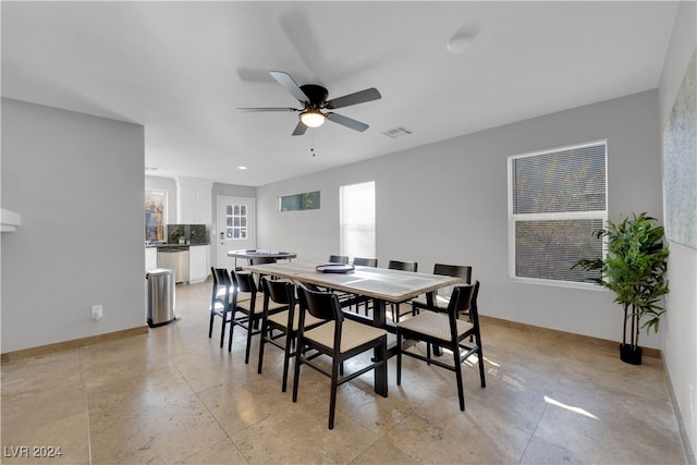 dining space with ceiling fan