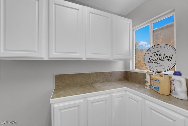 kitchen with white cabinetry