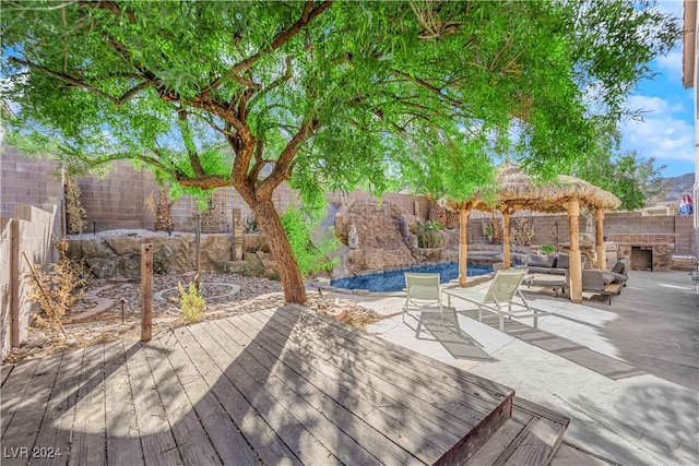 deck featuring an outdoor hangout area and a patio area