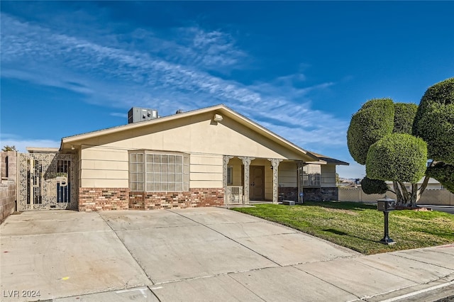 ranch-style house with a front yard