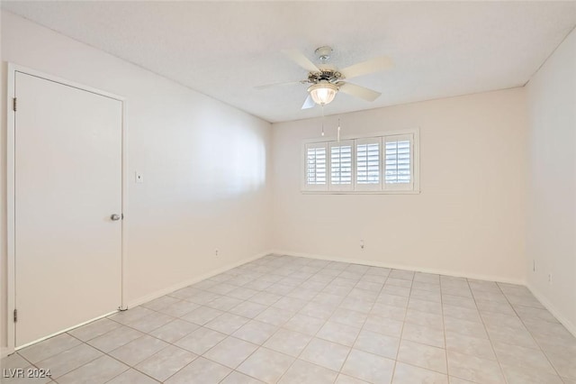 empty room featuring ceiling fan