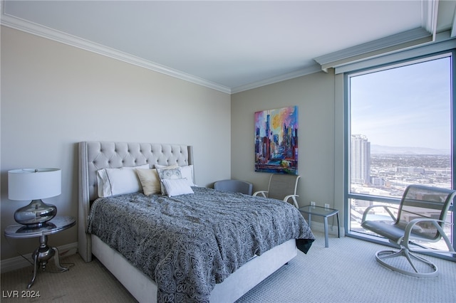 bedroom featuring multiple windows, carpet, and ornamental molding