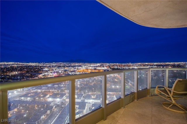 view of balcony at twilight