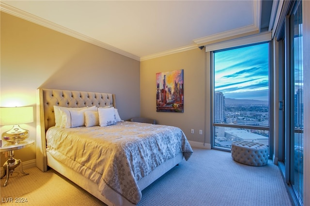 bedroom featuring carpet flooring and crown molding