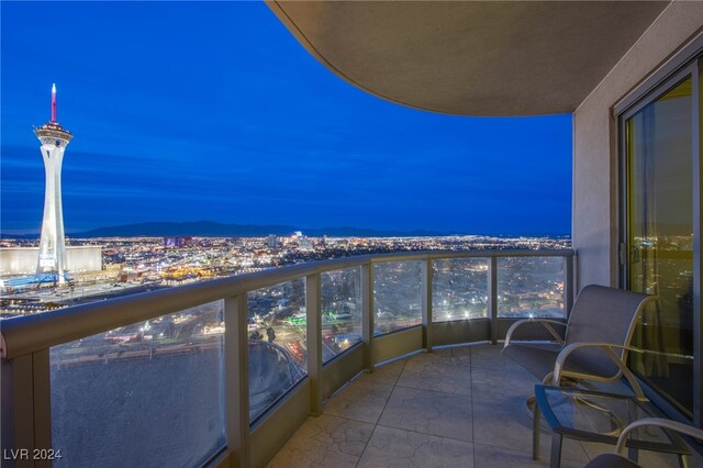 view of balcony at dusk