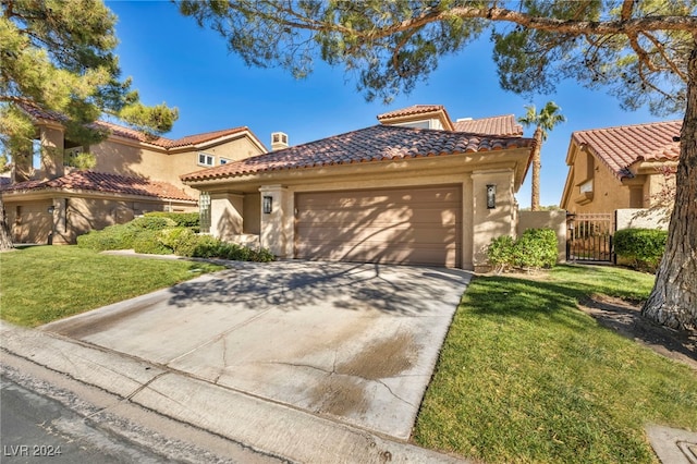 mediterranean / spanish-style house with a front lawn